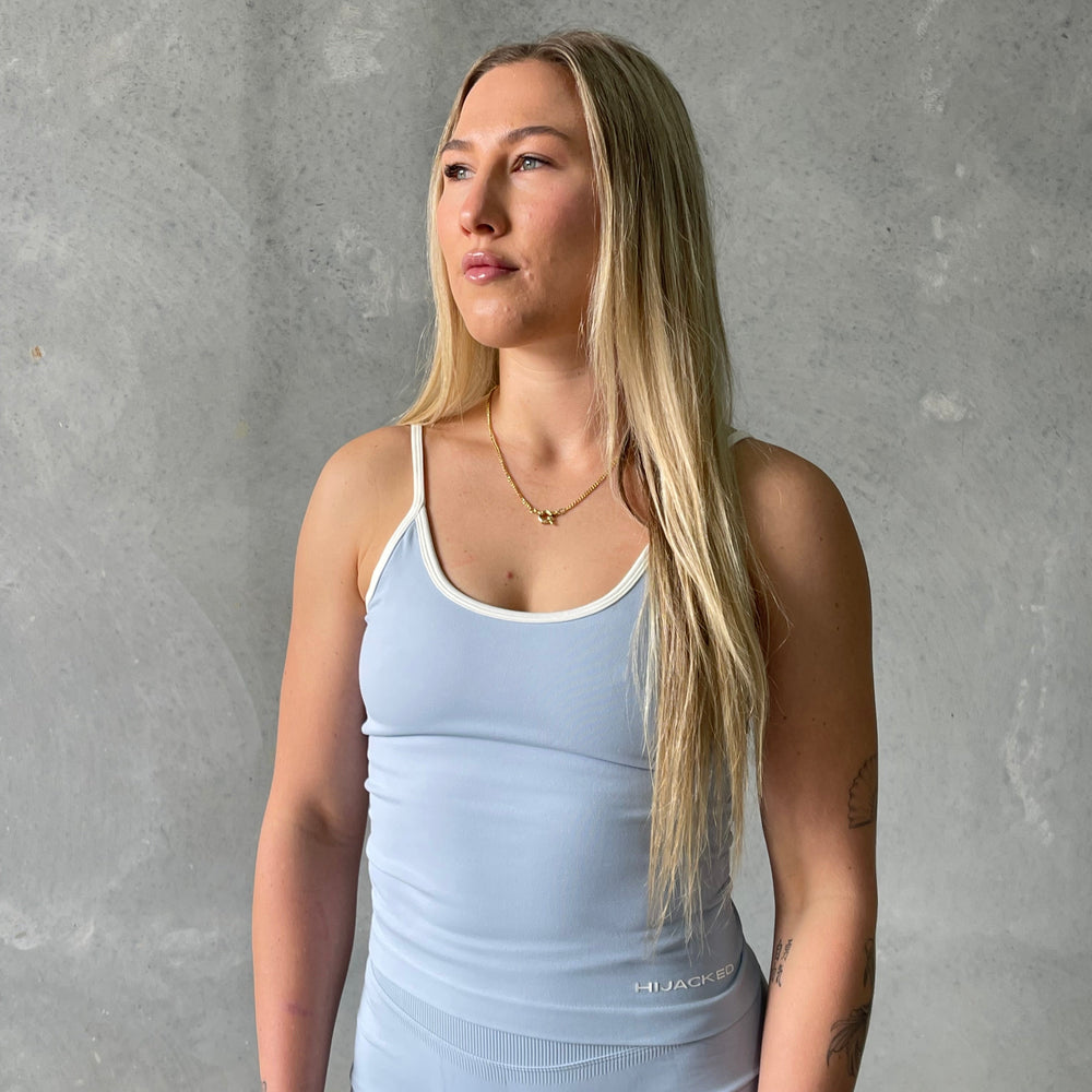 
                  
                    Linea Singlet
                  
                