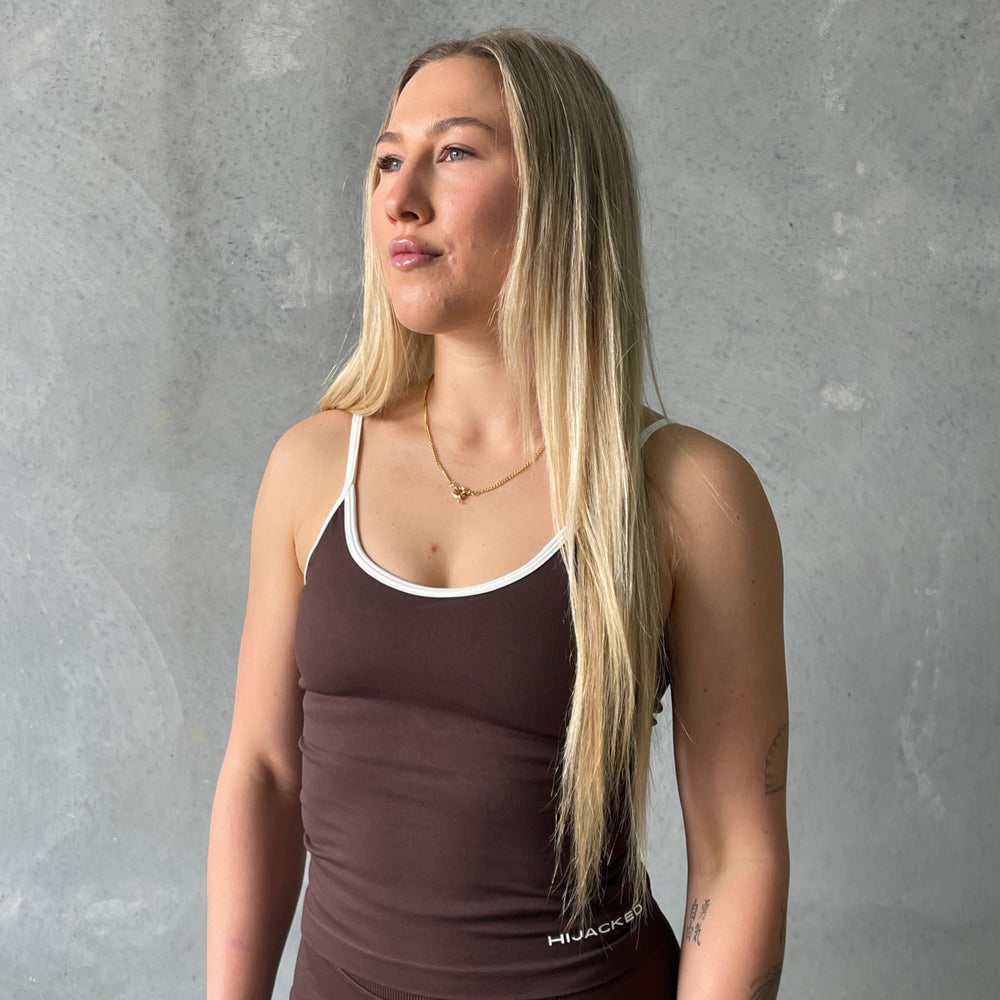 
                  
                    Linea Singlet
                  
                