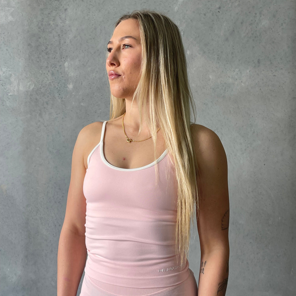 
                  
                    Linea Singlet
                  
                