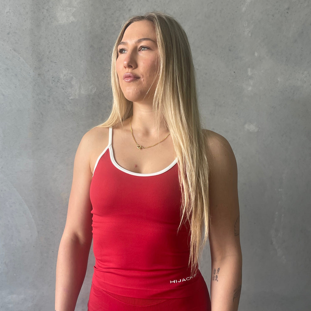 
                  
                    Linea Singlet
                  
                