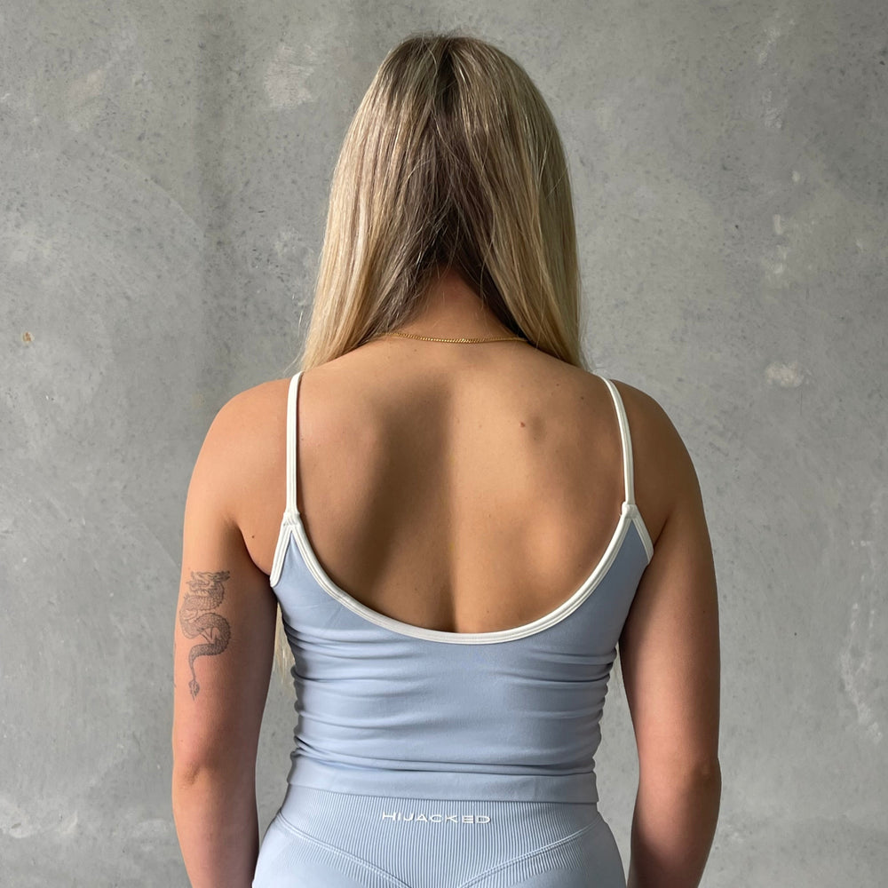
                  
                    Linea Singlet
                  
                