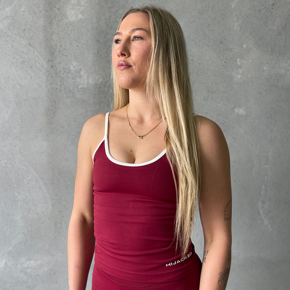 
                  
                    Linea Singlet
                  
                