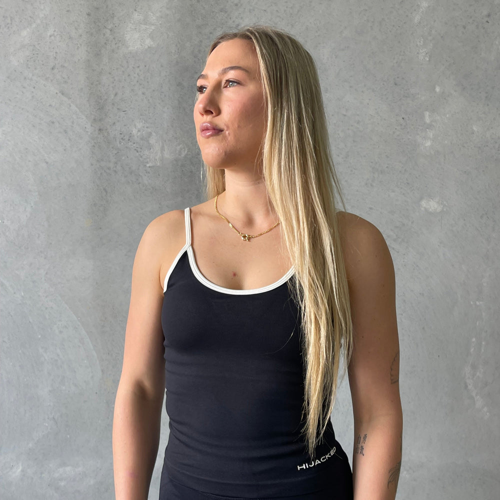 
                  
                    Linea Singlet
                  
                